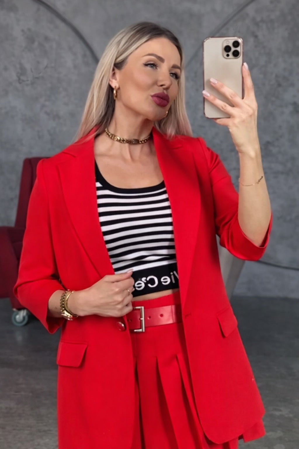 Coral Suit With a Unique Jacket and Skirt-Shorts Design